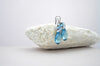 Aquamarine blue colored teardrop crystal earrings