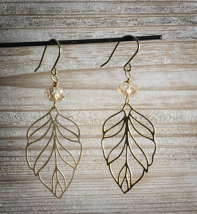 Gold leaf earrings with   crystal -aNella Designs