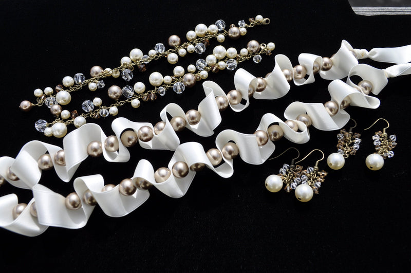 Ivory silk ribbon necklace with brown pearls