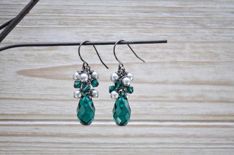 Emerald green crystal teardrop earrings with silver pearls