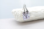 Mauve purple flat coin pearl earring with mixed crystals