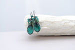 Emerald green teardrop pear shaped crystal earrings