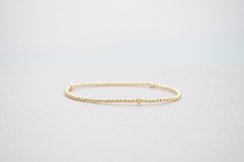 2mm Gold Filled Bracelet with Saucer Gold Beads