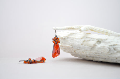 Red orange wing shaped crystal earrings